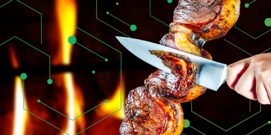 picanha sliced with knife by flames
